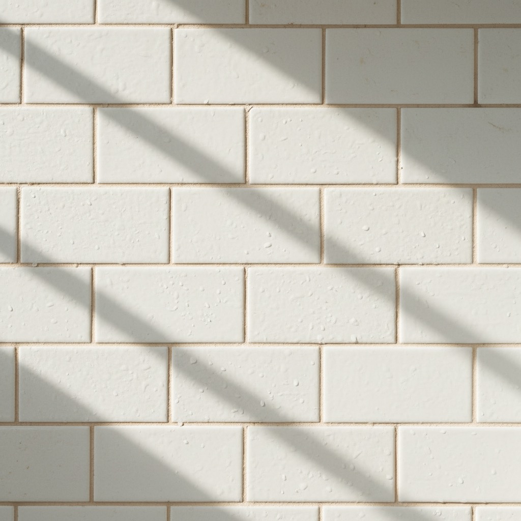 Clean white bathroom tile with bright morning light in a coastal Georgia home